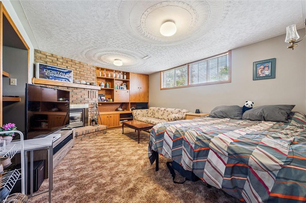 162 The Country Way, Kitchener, ON - Indoor Photo Showing Bedroom With Fireplace