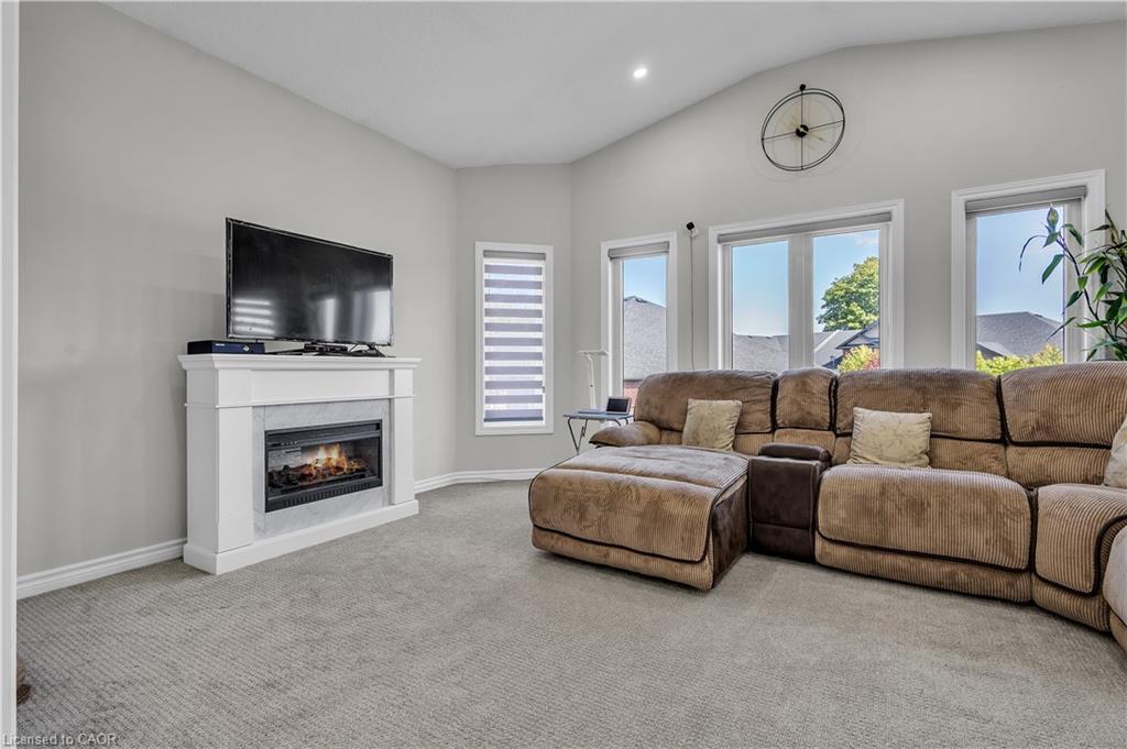 24 Sutherland Crescent, Ingersoll, ON - Indoor Photo Showing Living Room With Fireplace