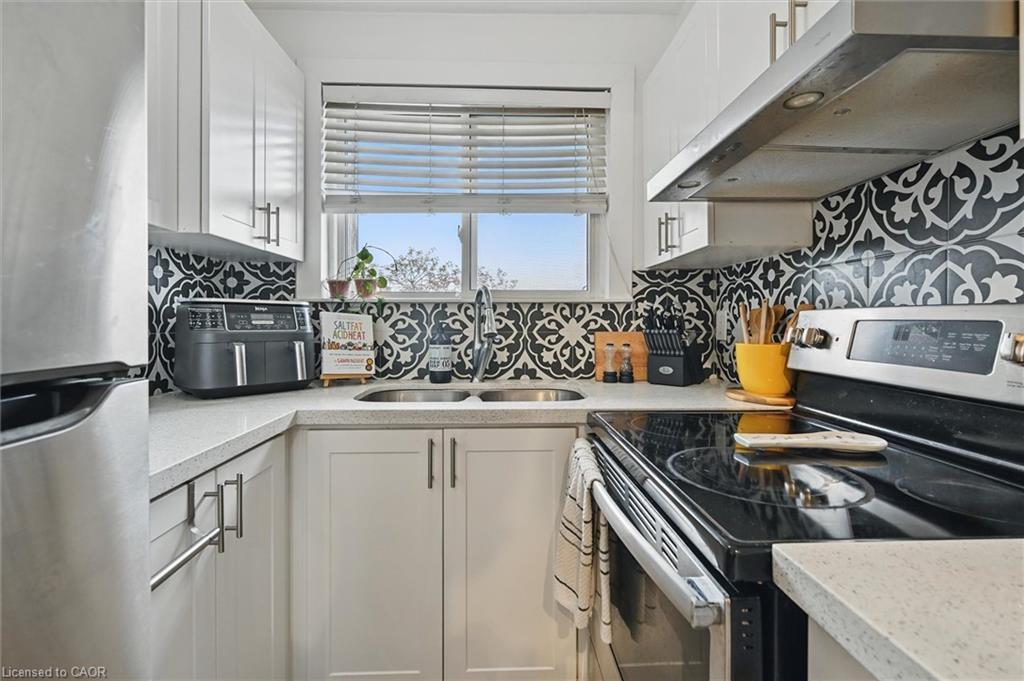 43-2373 King Street E, Hamilton, ON - Indoor Photo Showing Kitchen With Double Sink