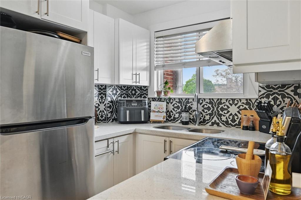 43-2373 King Street E, Hamilton, ON - Indoor Photo Showing Kitchen With Double Sink