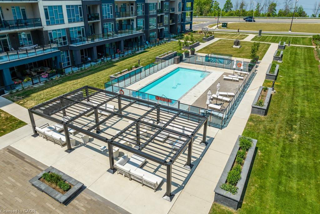 118-16 Concord Place, Grimsby, ON - Outdoor With In Ground Pool