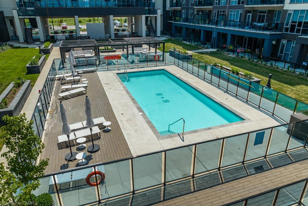 118-16 Concord Place, Grimsby, ON - Outdoor With In Ground Pool