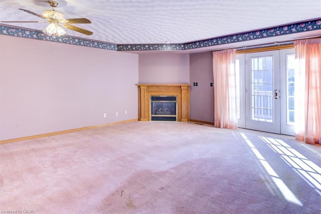 2-42 Donly Drive S, Simcoe, ON - Indoor With Fireplace