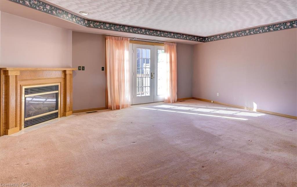 2-42 Donly Drive S, Simcoe, ON - Indoor With Fireplace