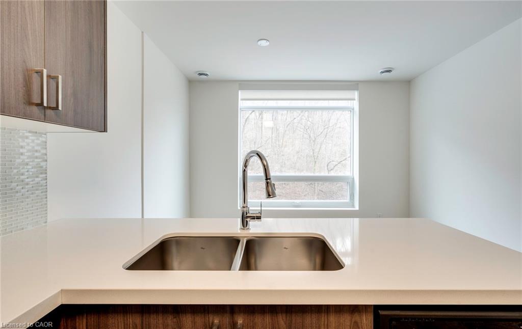 102-479 Charlton Avenue E, Hamilton, ON - Indoor Photo Showing Kitchen With Double Sink