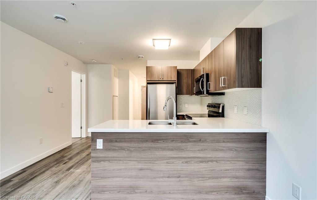 102-479 Charlton Avenue E, Hamilton, ON - Indoor Photo Showing Kitchen With Double Sink