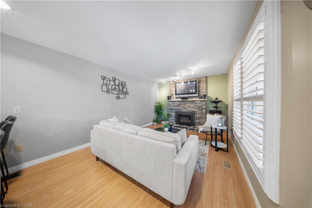 54 Pathfinder Crescent, Kitchener, ON - Indoor Photo Showing Living Room With Fireplace