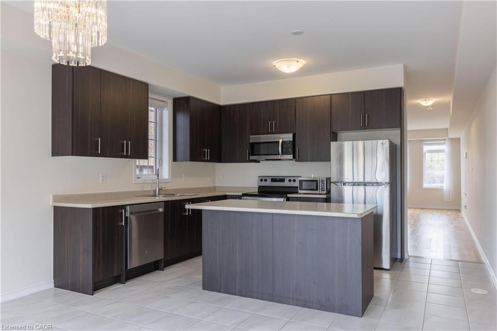 35-8317 Mulberry Drive, Niagara Falls, ON - Indoor Photo Showing Kitchen With Double Sink