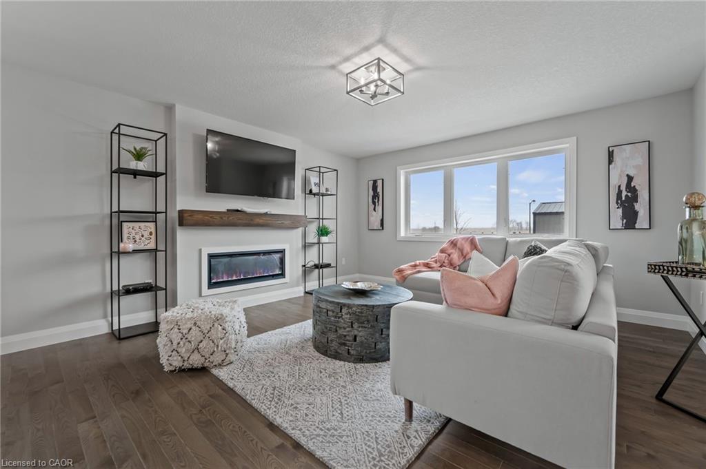 218 Bridge Crescent, Minto, ON - Indoor Photo Showing Living Room With Fireplace