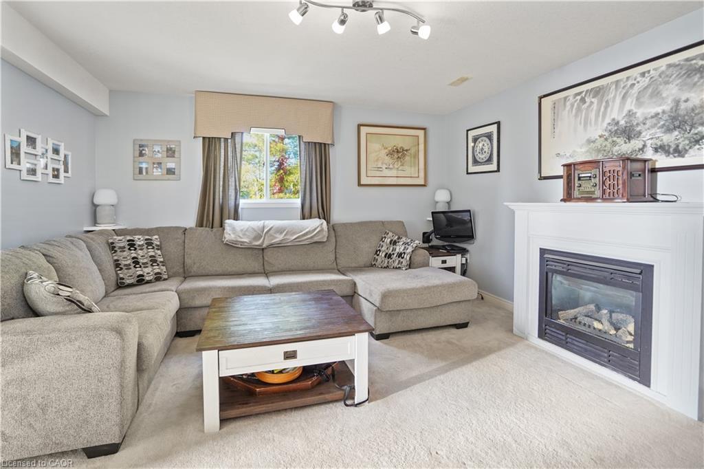 291 Schneller Drive, Baden, ON - Indoor Photo Showing Living Room With Fireplace