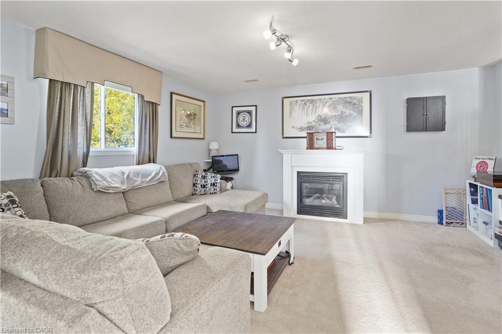 291 Schneller Drive, Baden, ON - Indoor Photo Showing Living Room With Fireplace