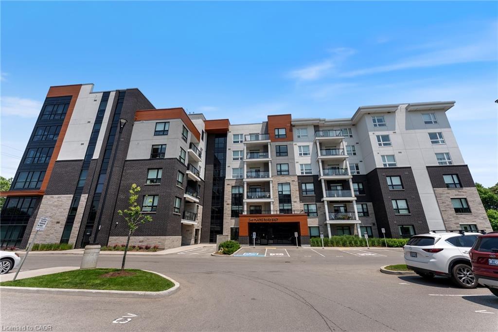 202-340 Plains Road E, Burlington, ON - Outdoor With Balcony With Facade