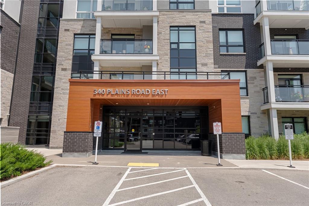 202-340 Plains Road E, Burlington, ON - Outdoor With Balcony With Facade