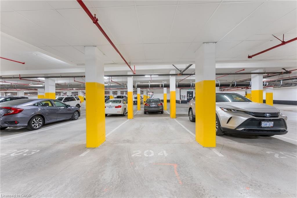 202-340 Plains Road E, Burlington, ON - Indoor Photo Showing Garage