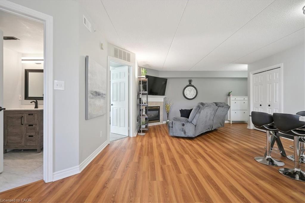 301-1431 Walkers Line, Burlington, ON - Indoor With Fireplace