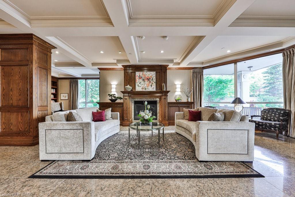 807-1900 The Collegeway, Mississauga, ON - Indoor Photo Showing Living Room With Fireplace