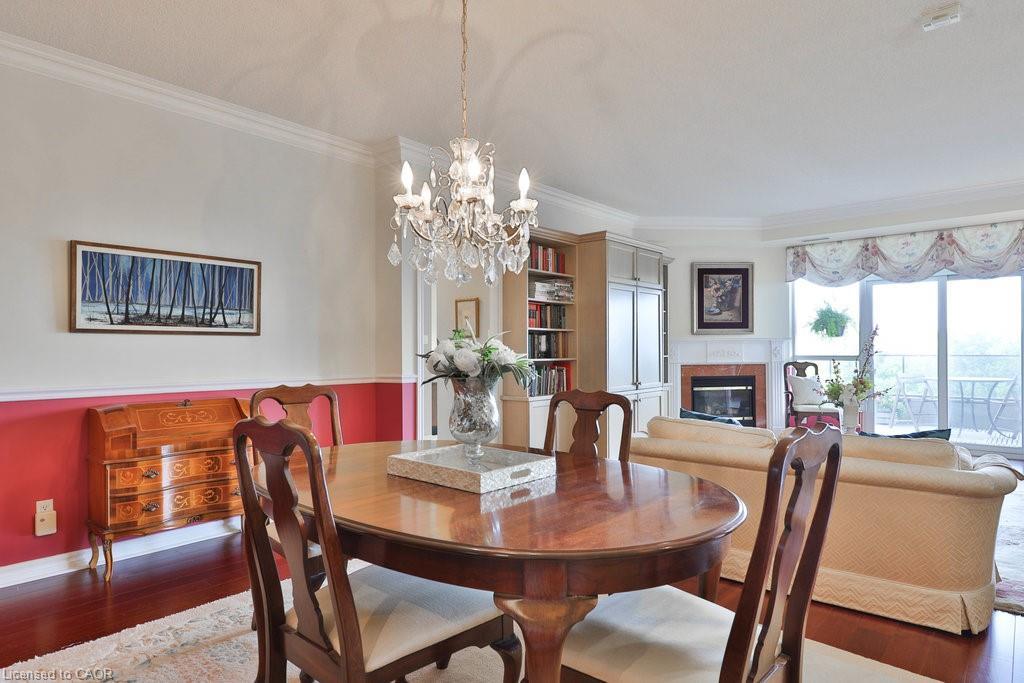 807-1900 The Collegeway, Mississauga, ON - Indoor Photo Showing Dining Room With Fireplace