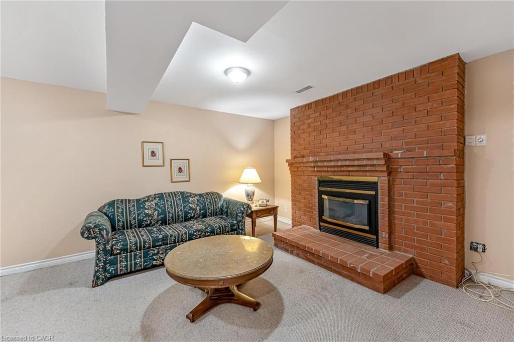 17-25 Kitty Murray Lane, Ancaster, ON - Indoor Photo Showing Living Room With Fireplace