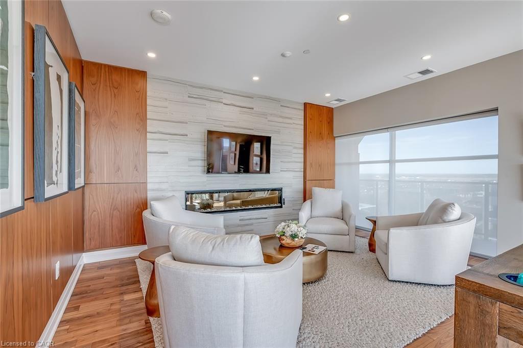 202-1878 Gordon Street, Guelph, ON - Indoor Photo Showing Living Room With Fireplace