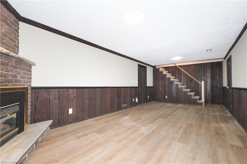 15 Niagara Road, Kitchener, ON - Indoor Photo Showing Other Room With Fireplace