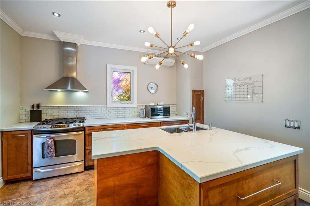 153 Geneva Street, St. Catharines, ON - Indoor Photo Showing Kitchen With Double Sink
