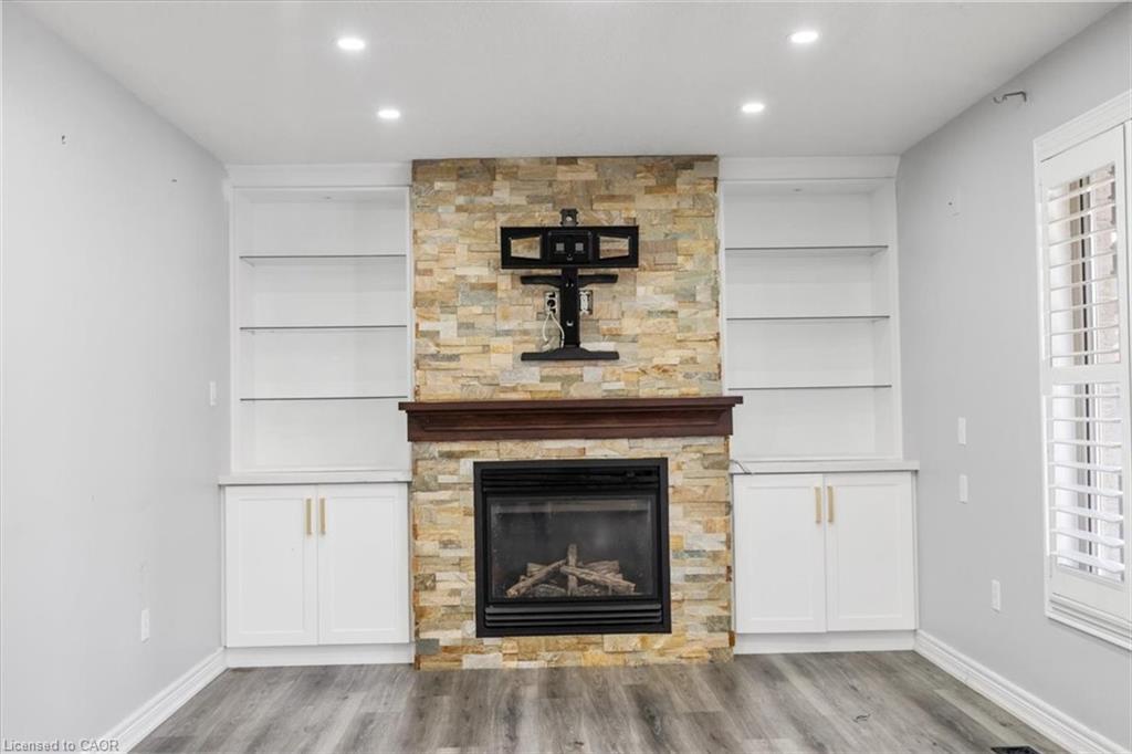 170 Southbrook Drive, Binbrook, ON - Indoor Photo Showing Living Room With Fireplace