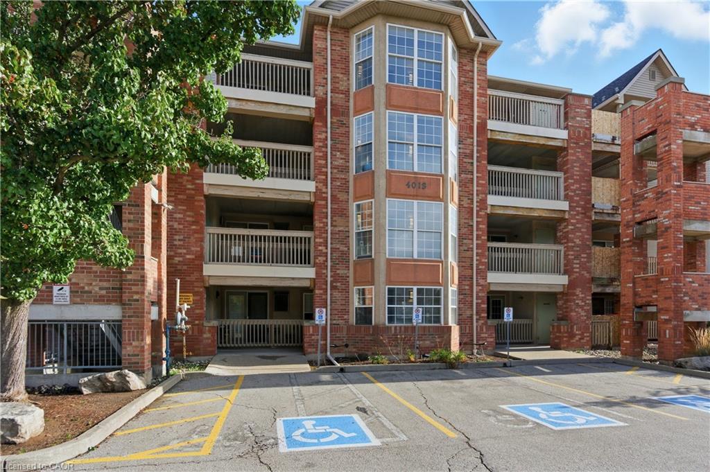 201-4013 Kilmer Drive, Burlington, ON - Outdoor With Balcony With Facade