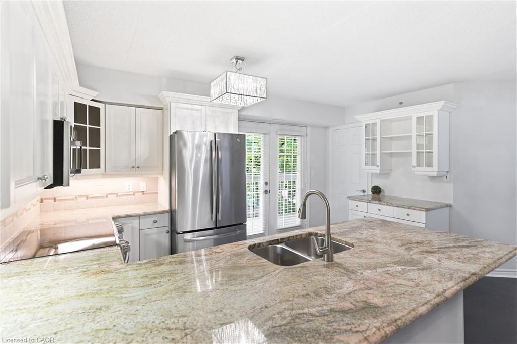 201-4013 Kilmer Drive, Burlington, ON - Indoor Photo Showing Kitchen With Stainless Steel Kitchen With Double Sink With Upgraded Kitchen