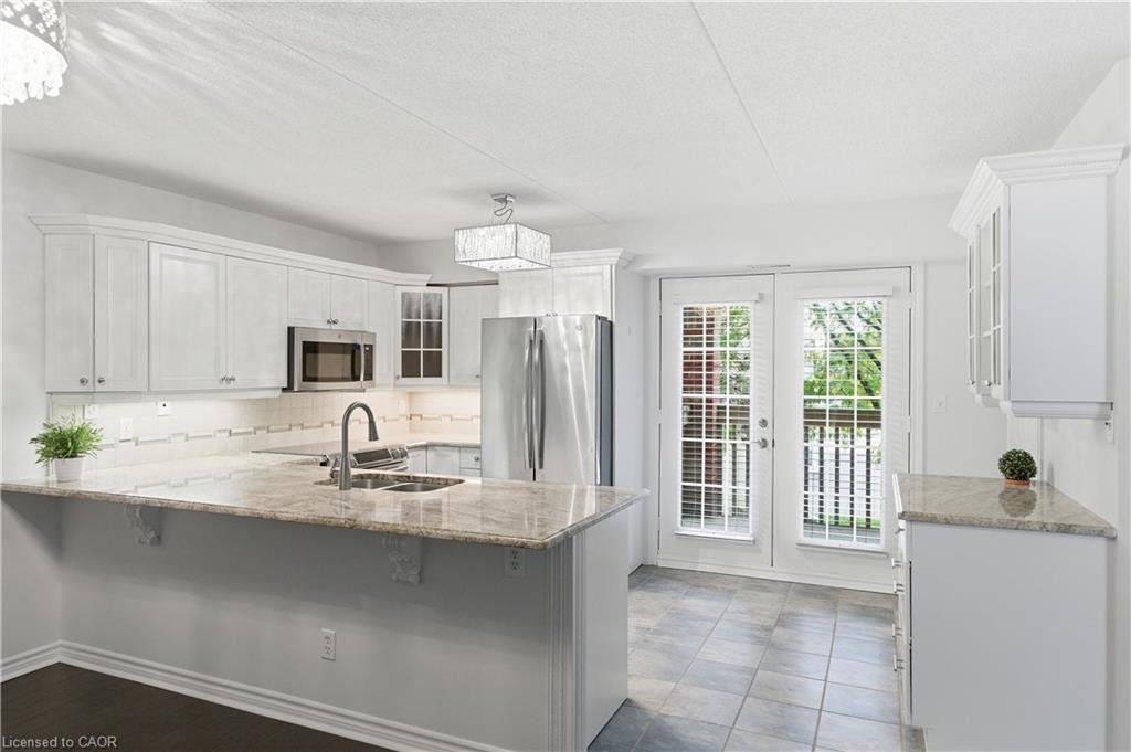 201-4013 Kilmer Drive, Burlington, ON - Indoor Photo Showing Kitchen
