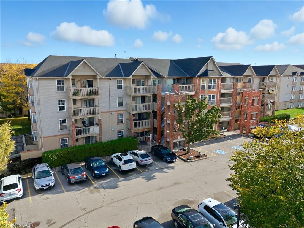 201-4013 Kilmer Drive, Burlington, ON - Outdoor With Balcony With Facade