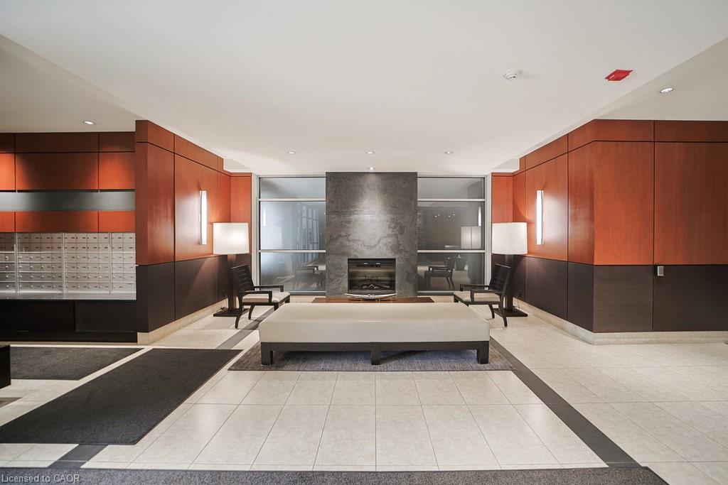 107-80 Port Street E, Mississauga, ON - Indoor Photo Showing Other Room With Fireplace