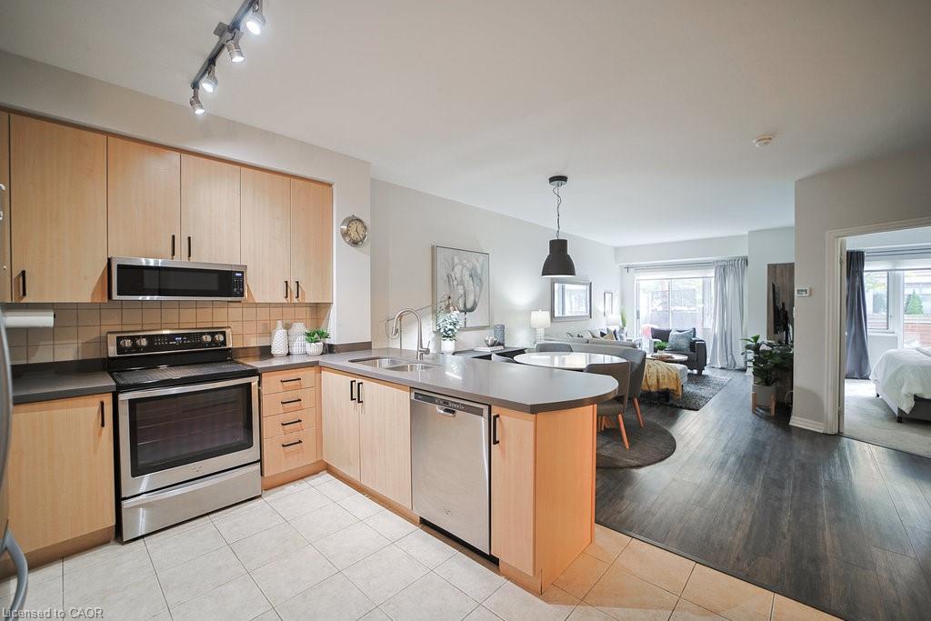 107-80 Port Street E, Mississauga, ON - Indoor Photo Showing Kitchen With Double Sink