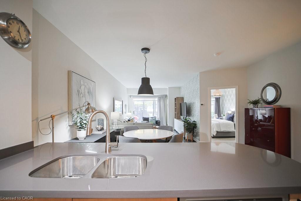 107-80 Port Street E, Mississauga, ON - Indoor Photo Showing Kitchen With Double Sink