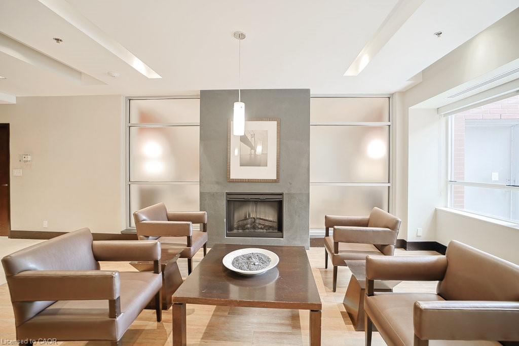 107-80 Port Street E, Mississauga, ON - Indoor Photo Showing Living Room With Fireplace