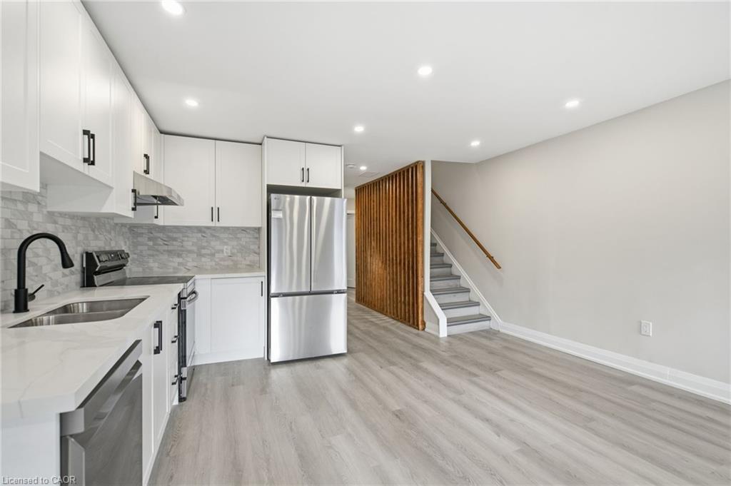 3-489 Cannon Street E, Hamilton, ON - Indoor Photo Showing Kitchen With Stainless Steel Kitchen With Double Sink With Upgraded Kitchen