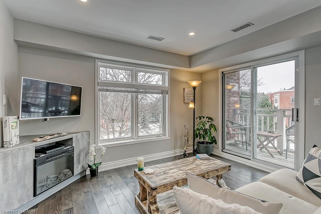 E-2386 Munn'S Avenue E, Oakville, ON - Indoor Photo Showing Living Room With Fireplace