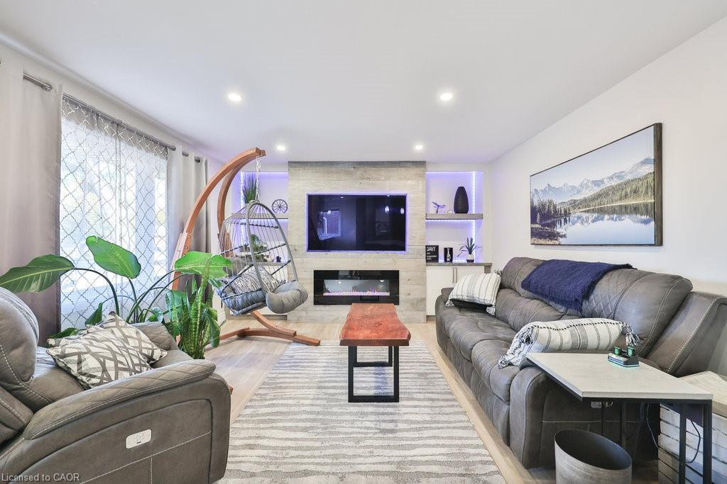 Upper-47 Castlefield Drive, Hamilton, ON - Indoor Photo Showing Living Room With Fireplace