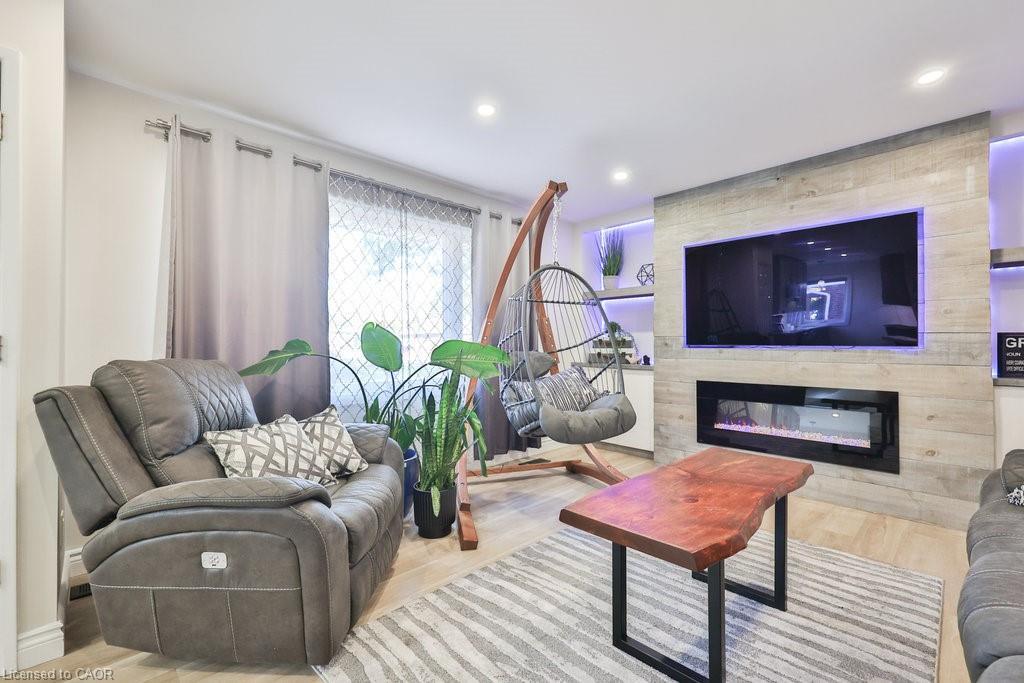 Upper-47 Castlefield Drive, Hamilton, ON - Indoor Photo Showing Living Room With Fireplace
