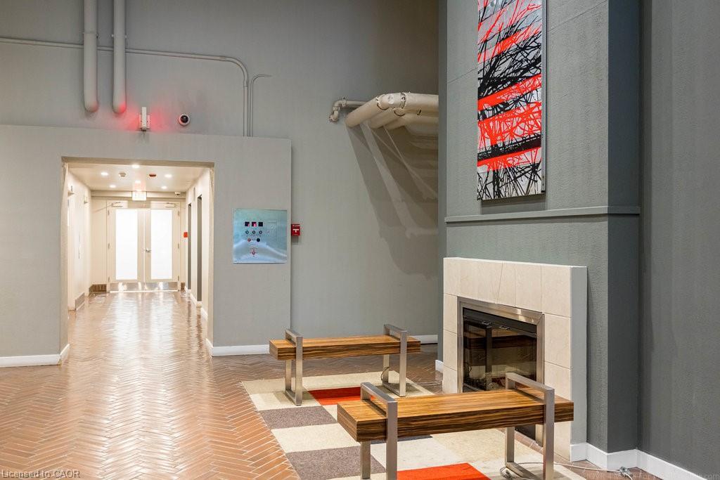 613-66 Bay Street S, Hamilton, ON - Indoor With Fireplace