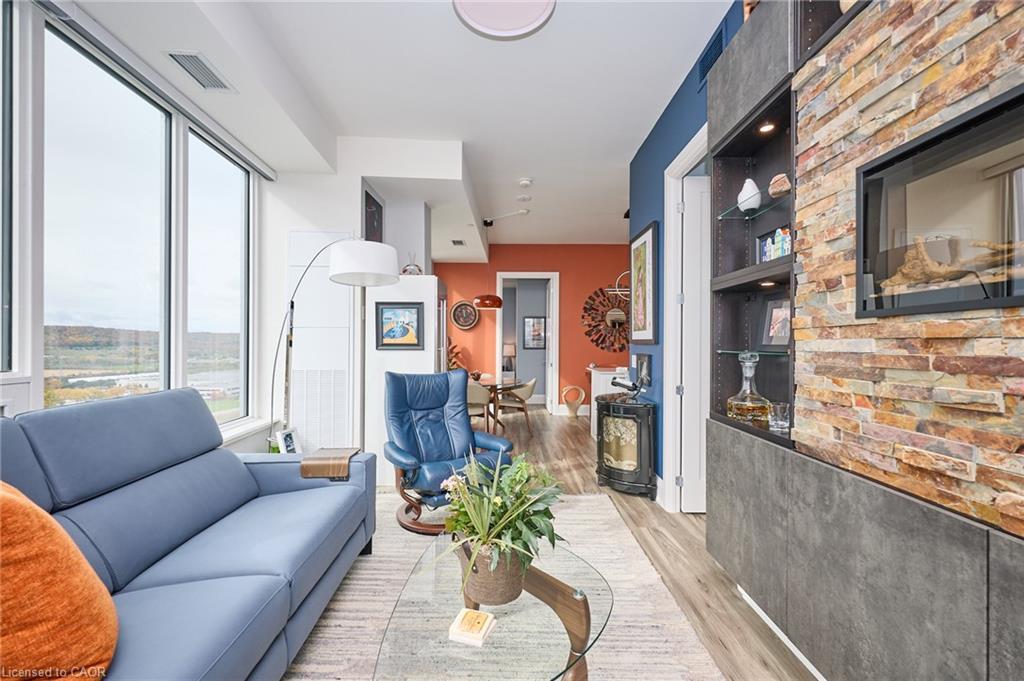 1807-385 Winston Road, Grimsby, ON - Indoor Photo Showing Living Room With Fireplace