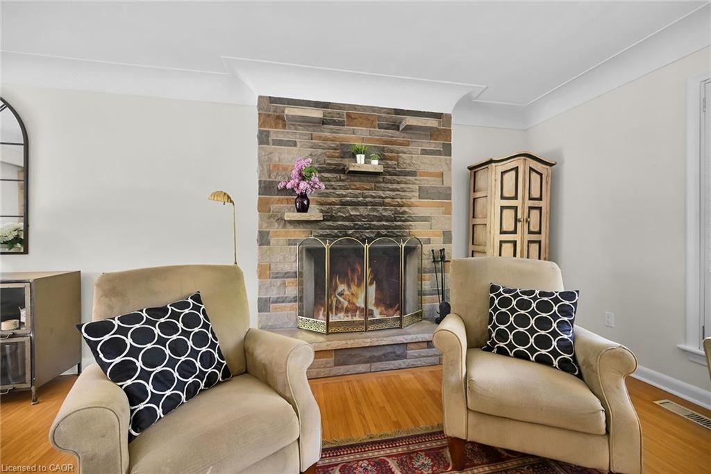 128 Oneida Boulevard, Ancaster, ON - Indoor Photo Showing Living Room With Fireplace