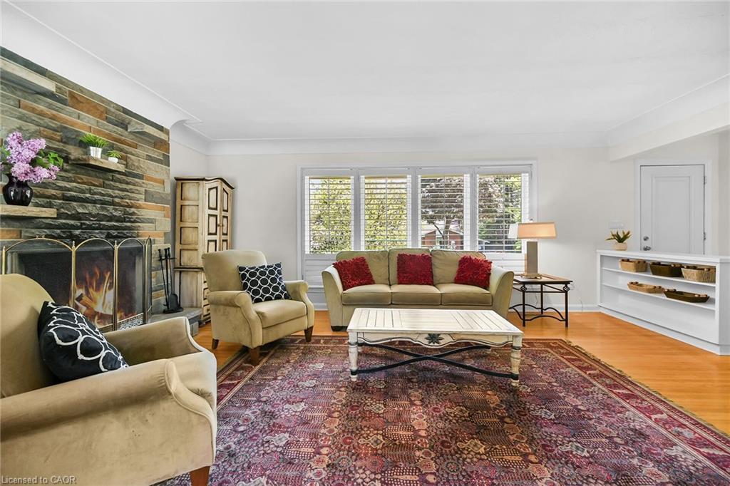 128 Oneida Boulevard, Ancaster, ON - Indoor Photo Showing Living Room With Fireplace