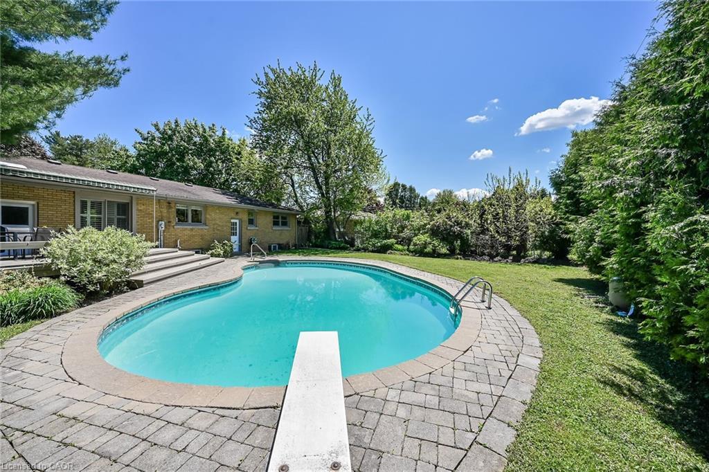 128 Oneida Boulevard, Ancaster, ON - Outdoor With In Ground Pool With Deck Patio Veranda With Backyard