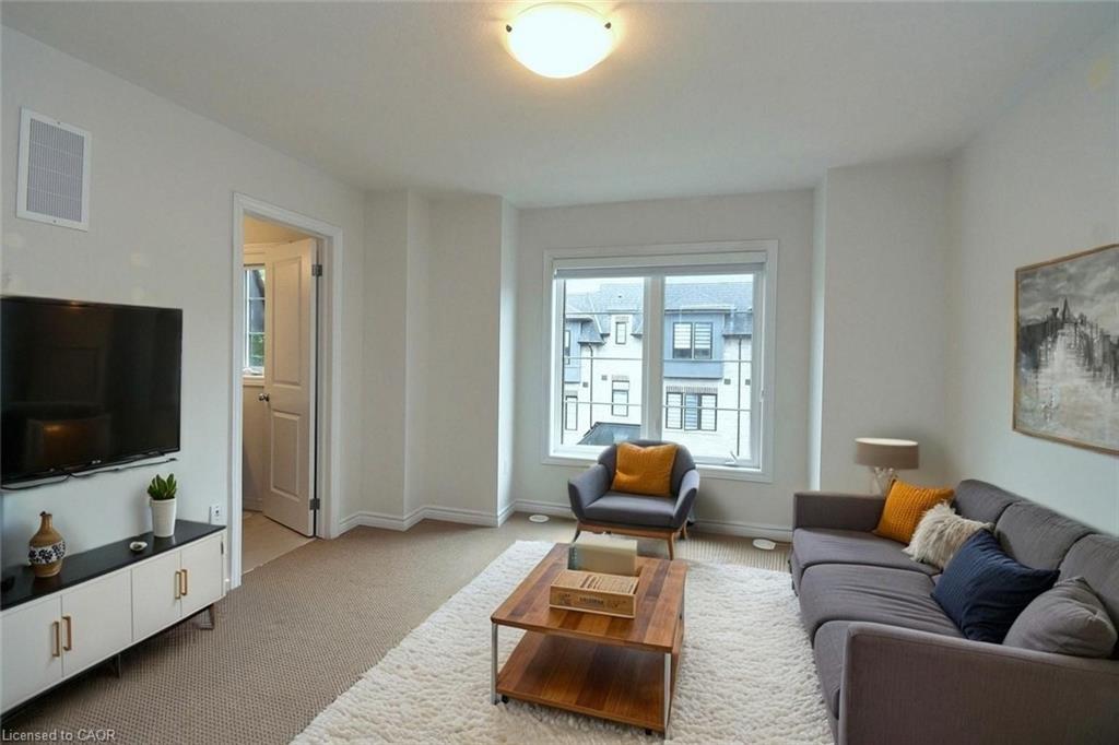 4-187 Wilson Street W, Ancaster, ON - Indoor Photo Showing Living Room