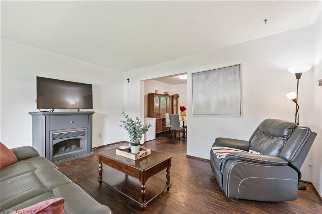 102 Rutherford Road N, Brampton, ON - Indoor Photo Showing Living Room With Fireplace