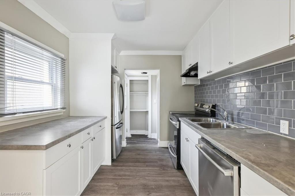 19 Seneca Street, St. Catharines, ON - Indoor Photo Showing Kitchen With Double Sink