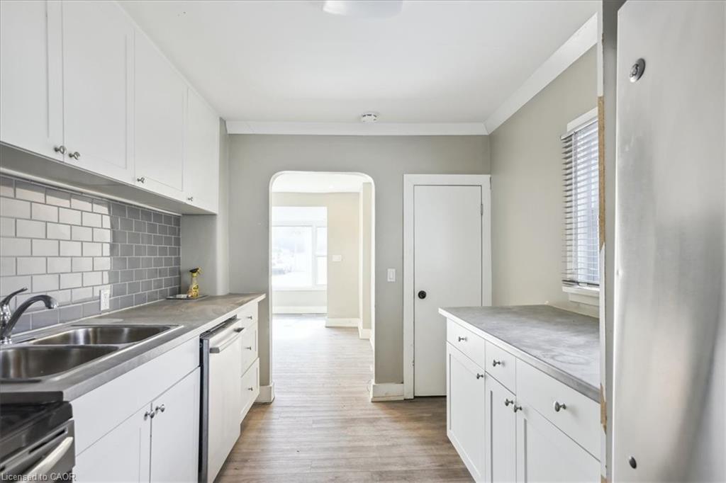 19 Seneca Street, St. Catharines, ON - Indoor Photo Showing Kitchen With Double Sink