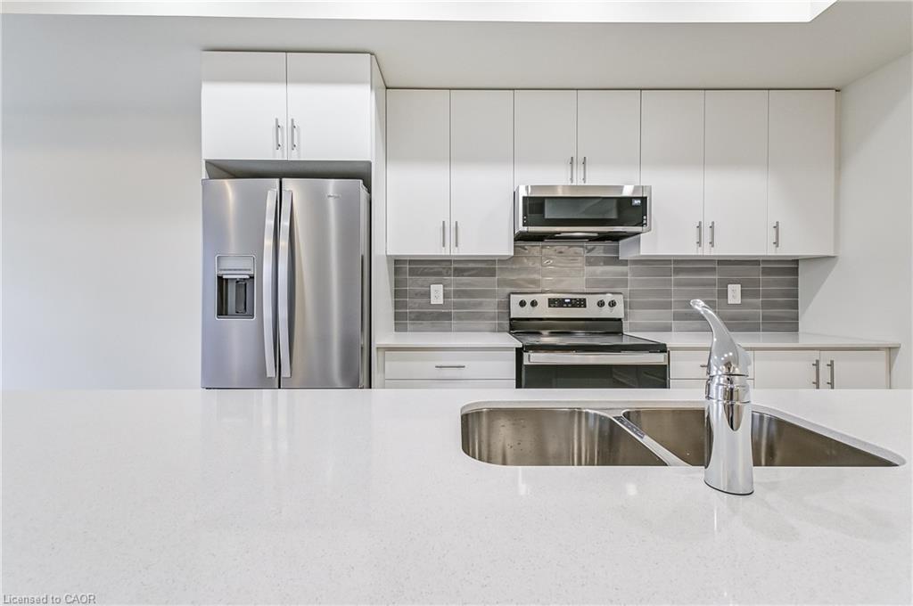 202-755 Omega Drive, Pickering, ON - Indoor Photo Showing Kitchen With Stainless Steel Kitchen With Double Sink With Upgraded Kitchen