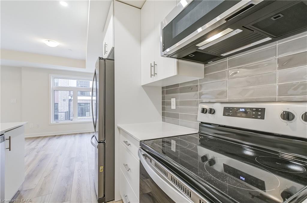 202-755 Omega Drive, Pickering, ON - Indoor Photo Showing Kitchen With Stainless Steel Kitchen With Upgraded Kitchen