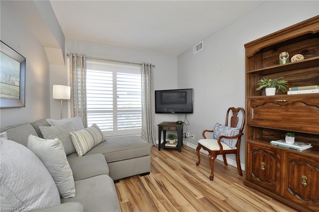 302-8 Harris Street, Cambridge, ON - Indoor Photo Showing Living Room With Fireplace
